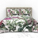 Dekbedovertrek Witte en roze bloemen op bed