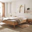 Metaalrvij houten bed Como met ronde poot