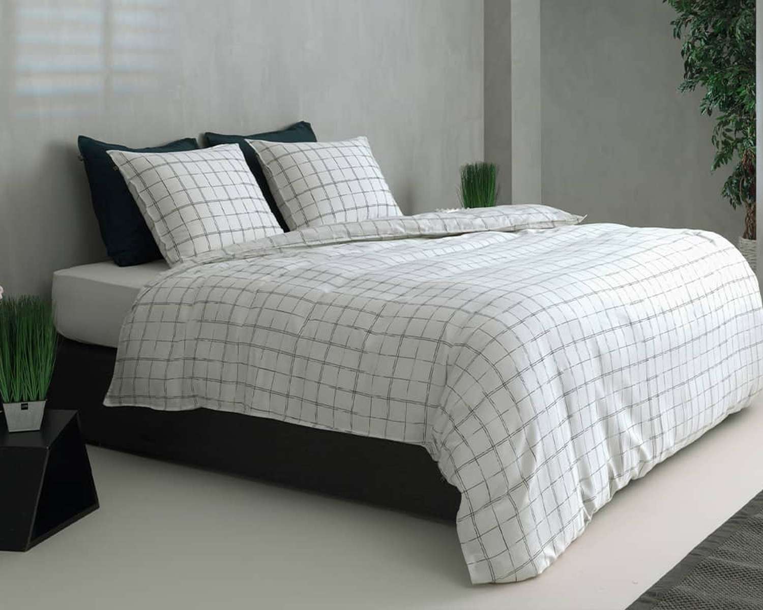 Dekbedovertrek ruiten hokjes op bed