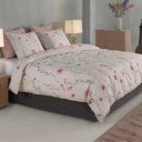 Dekbedovertrek Roze bloemen oase op bed voeten einde